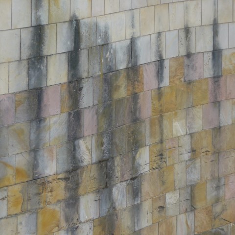 d10273: semi-abstract photo (marks on riverside wall, Berlin) by Ewart Shaw