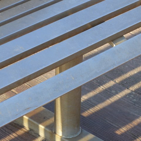 d10897: semi-abstract photo (close-up of metal bench and shadows) by Ewart Shaw