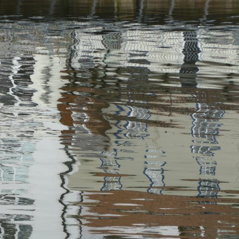 d20414: semi-abstract photo (reflection of house in Whitby harbour) by Ewart Shaw