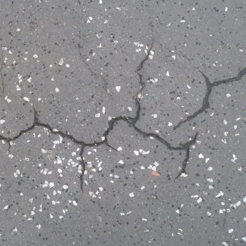 t00107: semi-abstract photo (crack in pavement) by Ewart Shaw