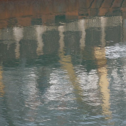 t10568: semi-abstract photo (reflection of boat in harbour) by Ewart Shaw