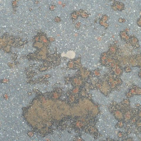 t20465: semi-abstract photo (brown and grey road surface with chewing gum) by Ewart Shaw