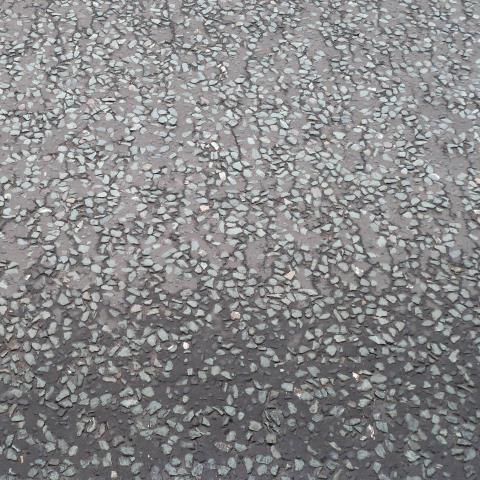 t30382: semi-abstract photo (pebbly road surface, Scarborough) by Ewart Shaw